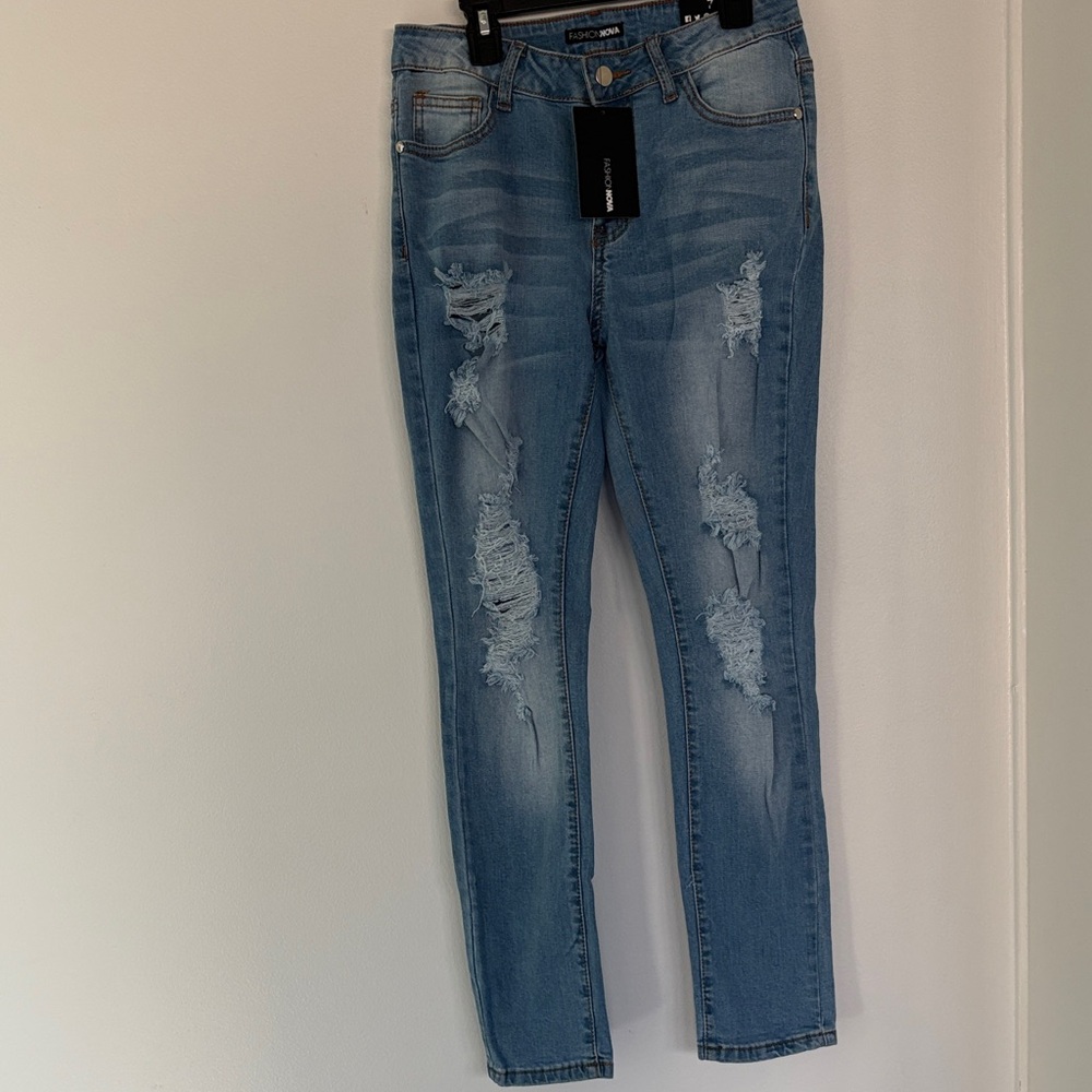 Fashion Nova Light Blue Distressed Skinny Jeans